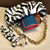 Stunning Zebra Printed Cloud Bag With Detachable Sling Belt
