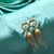 Antique Style Golden Solid Copper Jhumka Earring