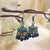 Solid Handmade Jhumka With Blue Stones Earring