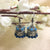 Solid Handmade Jhumka With Blue Stones Earring