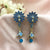 Gorgeous Flower Peacock With Flower Jhumka Earrings