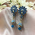 Gorgeous Flower Peacock With Flower Jhumka Earrings