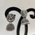 Hollow Flower Silver Round Jhumka Earring